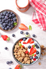 Wall Mural - healthy breakfast with muesli and berry fruit