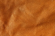 Orange leather texture.