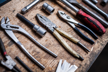 Tools on wooden plank