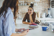 © Lumina Images/Blend Images - Caucasian women talking in kitchen