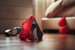 Leinwandbild Motiv Bedroom mess with lingerie and shoes, quick sex concept