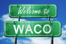 Waco Vintage Green Road Sign With Blue Sky Background