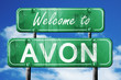 avon vintage green road sign with blue sky background