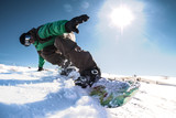 Snowboard freerider in the mountains