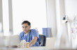 © JGI/Tom Grill/Blend Images - Mixed race doctor working on laptop