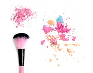 Wall Mural - Close up of crushed blush on white background and cosmetic brush