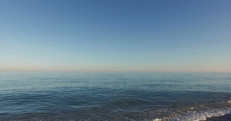 Wall Mural - 4k Crane movement for the Mediterranean Sea. Waves Crashing onto the shore
