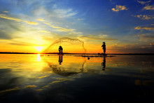 Two Fishermen In Golden Morning Light..