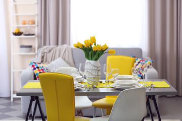 Wall Mural - Dining room interior with sofa and table served for dinner