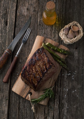 Canvas Print - Beef steak grilled with rosemary and asparagus