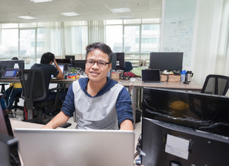 Wall Mural - asian man software developer working