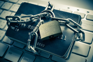 Wall Mural - chained credit cards - credit card data encryption protection concept