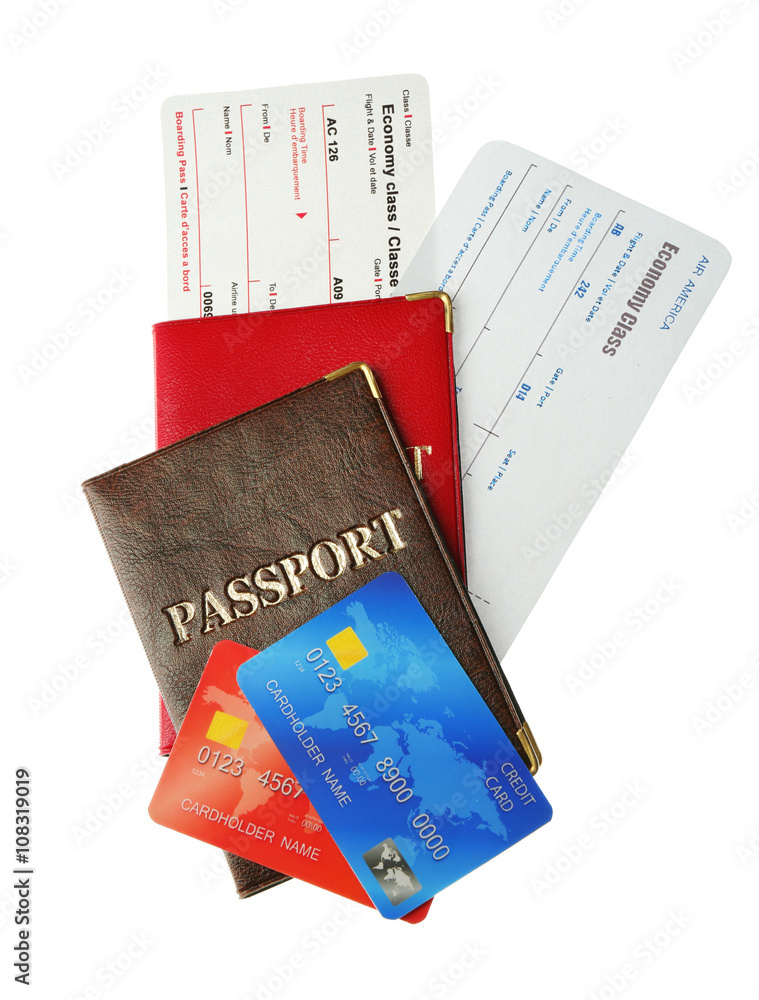 Credit cards with passports and tickets isolated on white