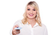 © stockyimages - Ravishing lady offering you debit card