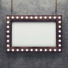Wall Mural - Wooden frame on concrete background illuminated by light bulbs. 3D rendering