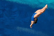 Attractive female diver in the air. Shot from above