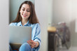 © pikselstock - Young woman with laptop