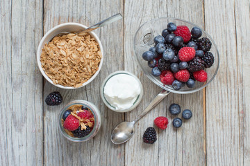 Wall Mural - Healthy breakfast with Fresh greek yogurt, flakes  and berries