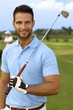 © nyul - Closeup portrait of goodlooking male golfer