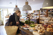 © Guerilla - Woman shopping for vegetables indoors