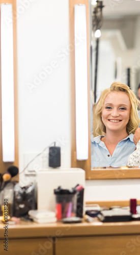 Fotografie, Obraz Make-up artist doing make up for young beautiful bride applying wedding make-up