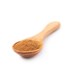 Canvas Print - Wooden spoon full of cinnamon