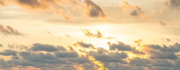 Wall Mural - sunset behind the cloud and orange sky