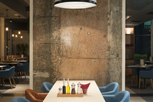 Modern Restaurant Interior With Concrete Wall