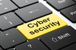 © Maksim Kabakou - Protection concept: Cyber Security on computer keyboard background