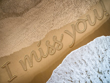 I Miss You Written On The Beach