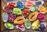 Fresh assorted berries, fruits top view background. Healthy, detox, superfood.