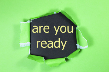 Wall Mural - The question Are You Ready appearing behind torn green paper