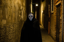 Woman In Dark Halloween Like Costume