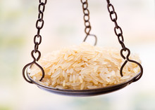 Rice Grain In Balance Scale