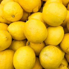 Wall Mural - yellow lemons textures backgrounds.  Group of fresh lemons.