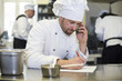 © gpointstudio - Chef making order for the supplier.