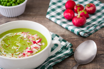 Sticker - Peas cream with radishes on rustic wooden table
