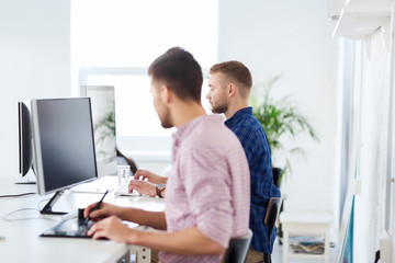 creative man or student with computer at office