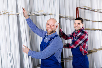 Wall Mural - workmen inspecting window frames