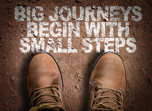 Top View Of Boot On The Trail With The Text: Big Journeys Begin With Small Steps