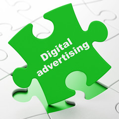 Advertising concept: Digital Advertising on puzzle background