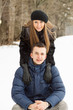 © BY-_-BY - Happy Young Couple in Winter Park having fun
