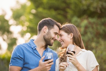 Wall Mural - Happy couple with wineglass