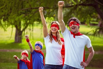 Wall Mural - Happy family pretending to be superhero 