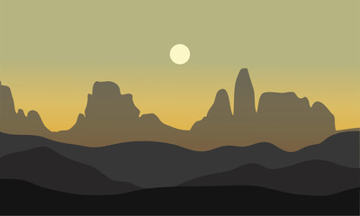 silhouette of desert with moon