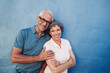 © Jacob Lund - Smiling mature couple standing together