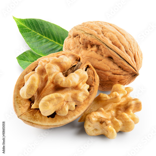 Fotografía Walnuts with leaves isolated on white. With clipping path.