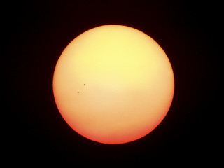 bangkok thailand, march 21,2016 : the sun seen from planet earth, with sunspots visible as dark spot