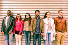 Multiracial Serious People Lineup As Mugshot Is Standing Next To Metal Rolling Shutter - Unemployed Multi Ethnic Friends Line Up Outdoor - Concept Of Discrimination And Youth Concern For The Future