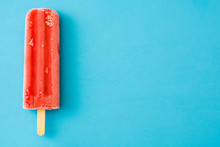 Strawberry Popsicle On Blue Background
